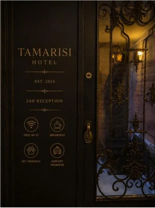 The New Tamarisi Hotel entrance sign